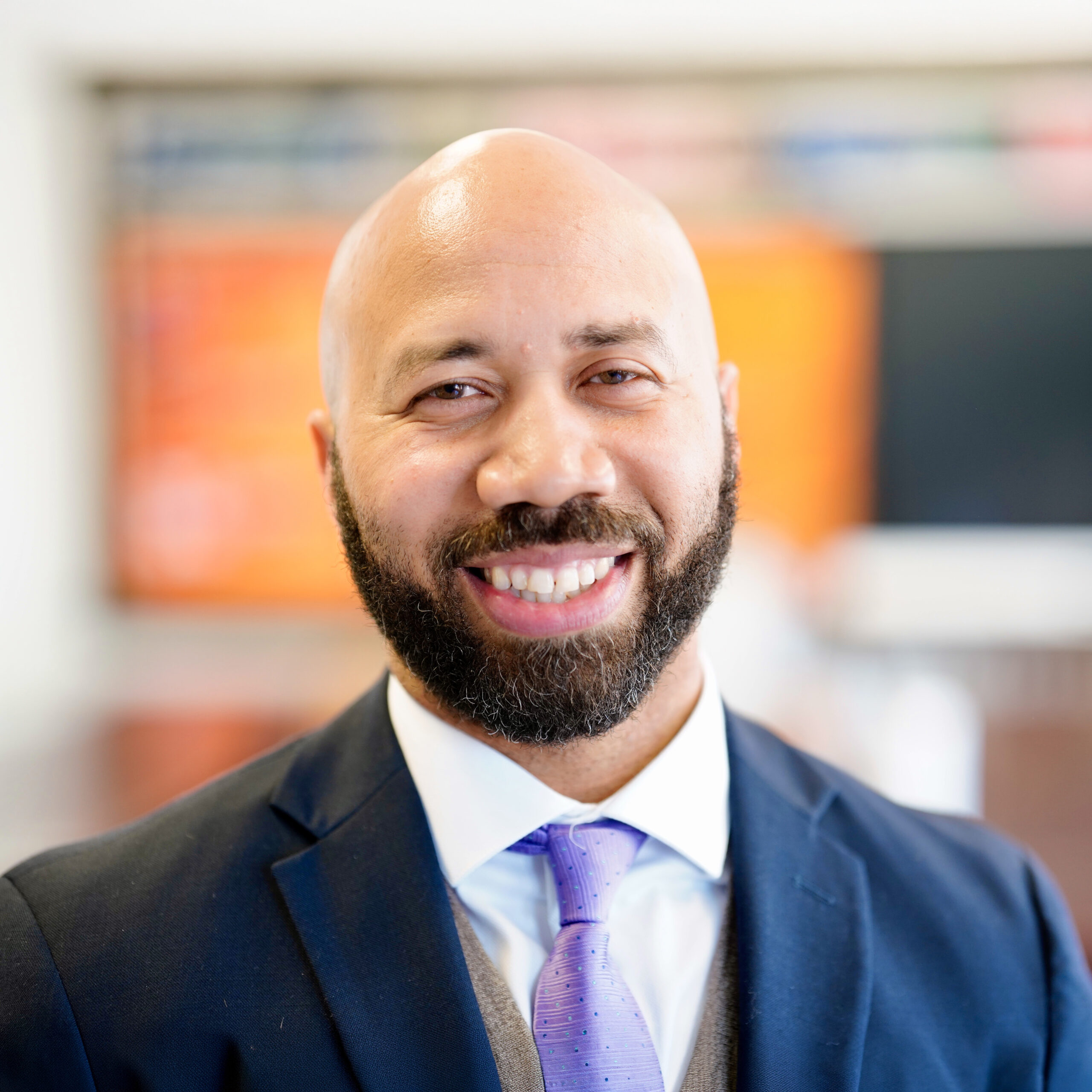 Dr. Khary H. Moody, Principal of James R. Ludlow School, smiling for a professional portrait.